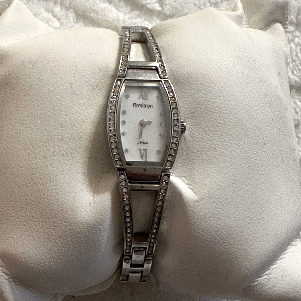 Silver-toned vintage-style watch photographed for a marketplace listing